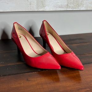 Monet Italian deep coral red color, 2.5” pump.